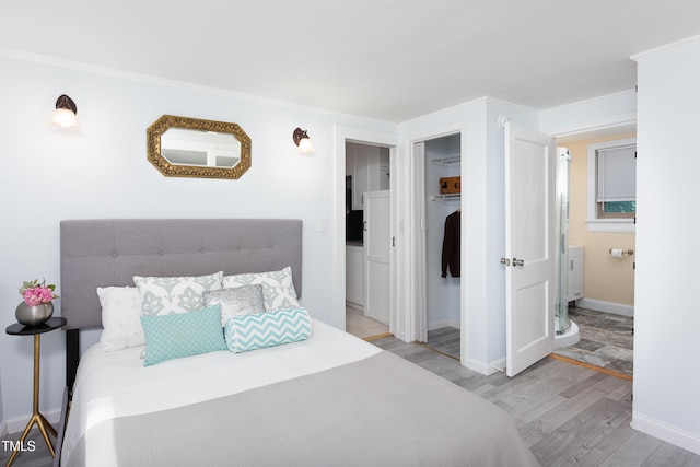 126 Barclay Rd, Chapel Hill, NC 27516 - bedroom featuring wood finished floors, baseboards, and ornamental molding