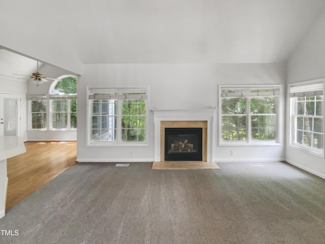105 Crosswaite Way, Cary, NC 27518 - unfurnished living room featuring vaulted ceiling, carpet, a fireplace, a ceiling fan, and baseboards