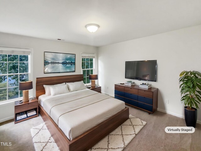 105 Crosswaite Way, Cary, NC 27518 - bedroom featuring carpet flooring and baseboards