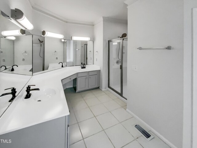 105 Crosswaite Way, Cary, NC 27518 - bathroom with a shower stall, tile patterned flooring, double vanity, and crown molding