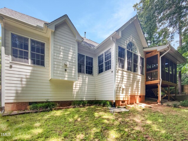 105 Crosswaite Way, Cary, NC 27518 - view of side of home featuring a sunroom, crawl space, and a yard