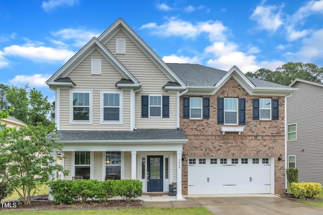 3449 S Beaver Ln, Raleigh, NC 27604 - view of front of house featuring concrete driveway, an attached garage, roof with shingles, a porch, and brick siding