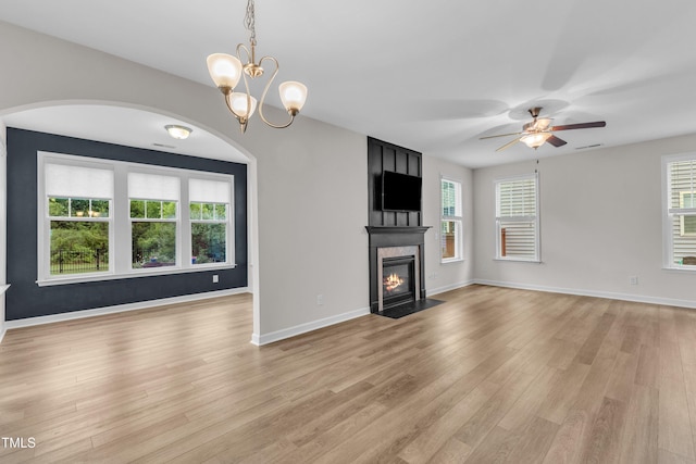 3449 S Beaver Ln, Raleigh, NC 27604 - unfurnished living room featuring healthy amount of natural light, light wood-style floors, and baseboards