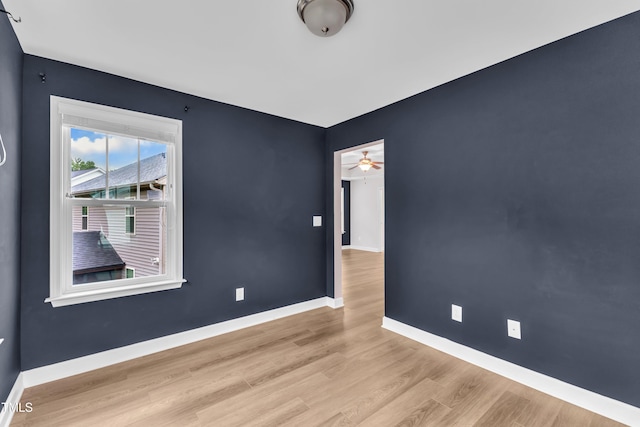 3449 S Beaver Ln, Raleigh, NC 27604 - unfurnished room with baseboards, wood finished floors, and a ceiling fan