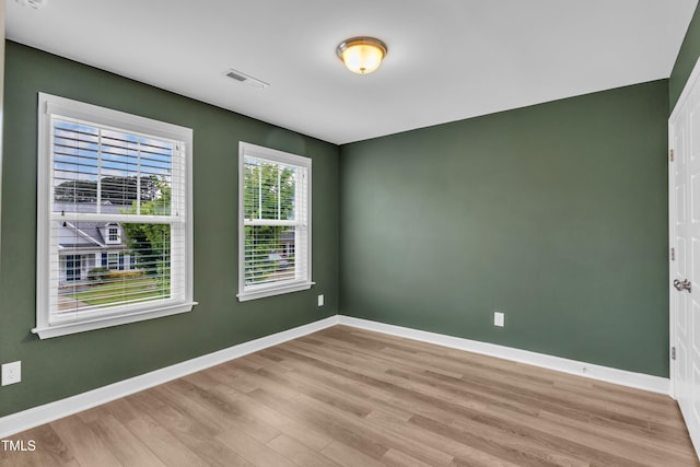3449 S Beaver Ln, Raleigh, NC 27604 - empty room featuring light wood-style floors and baseboards