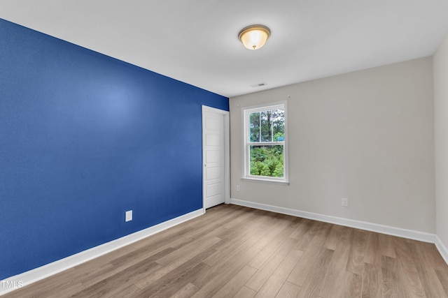 3449 S Beaver Ln, Raleigh, NC 27604 - empty room with wood finished floors and baseboards