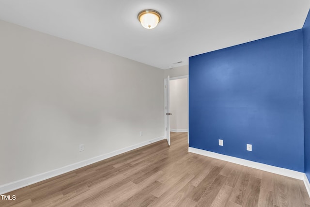 3449 S Beaver Ln, Raleigh, NC 27604 - spare room with wood finished floors and baseboards