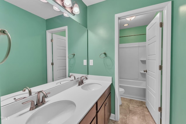 3449 S Beaver Ln, Raleigh, NC 27604 - bathroom with double vanity, toilet, and shower / washtub combination