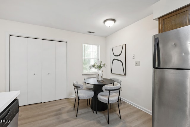 407 Gooseneck Dr Unit B1, Cary, NC 27513 - dining room featuring light wood-type flooring