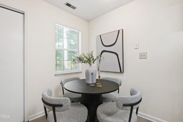 407 Gooseneck Dr Unit B1, Cary, NC 27513 - dining room with baseboards and wood finished floors