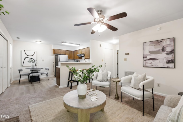 407 Gooseneck Dr Unit B1, Cary, NC 27513 - living area featuring light colored carpet and ceiling fan