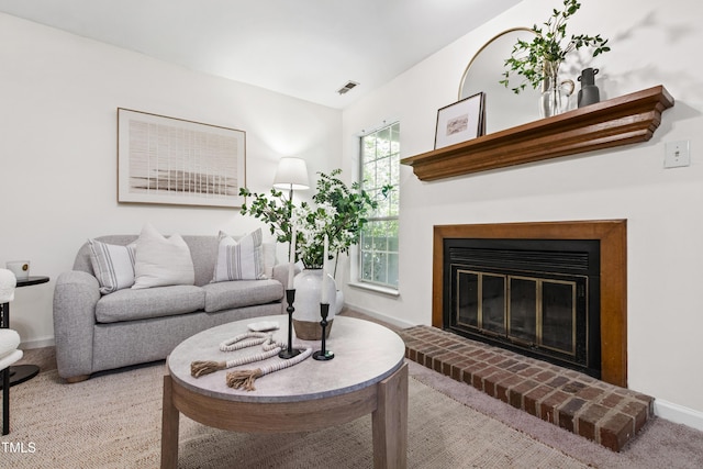 407 Gooseneck Dr Unit B1, Cary, NC 27513 - living area featuring a glass covered fireplace and carpet flooring