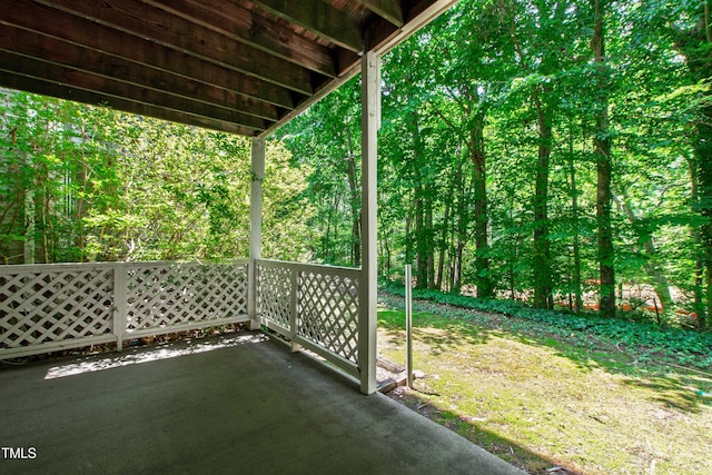 407 Gooseneck Dr Unit B1, Cary, NC 27513 - view of patio with a forest view