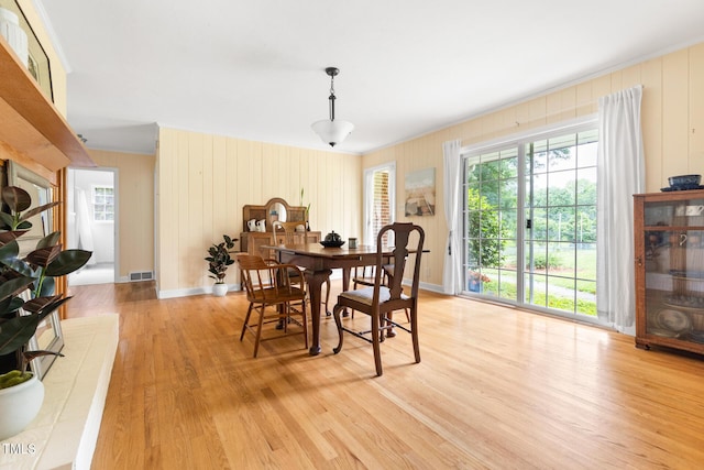 816 Miller Rd, Hillsborough, NC 27278 - dining area with light wood finished floors, healthy amount of natural light, crown molding, and baseboards