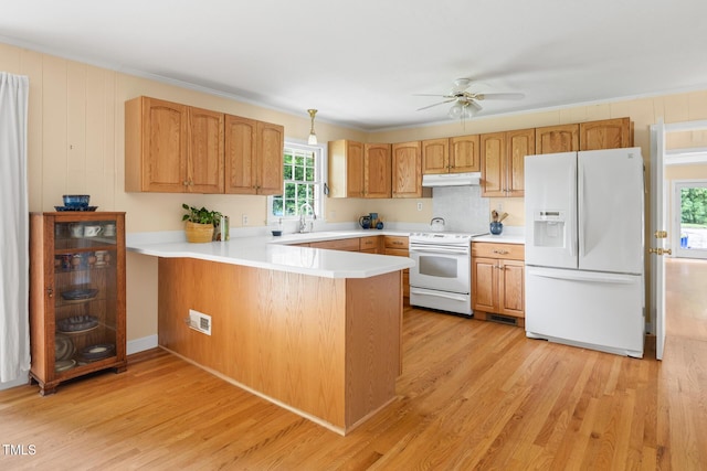 816 Miller Rd, Hillsborough, NC 27278 - kitchen featuring white appliances, under cabinet range hood, a ceiling fan, light wood-type flooring, and a peninsula