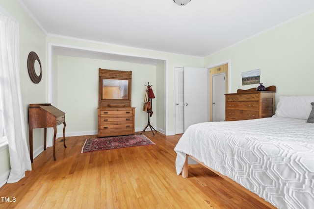 816 Miller Rd, Hillsborough, NC 27278 - bedroom featuring hardwood / wood-style floors, ornamental molding, and baseboards