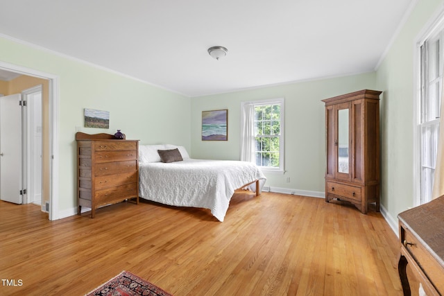 816 Miller Rd, Hillsborough, NC 27278 - bedroom featuring light wood-style floors, crown molding, and baseboards