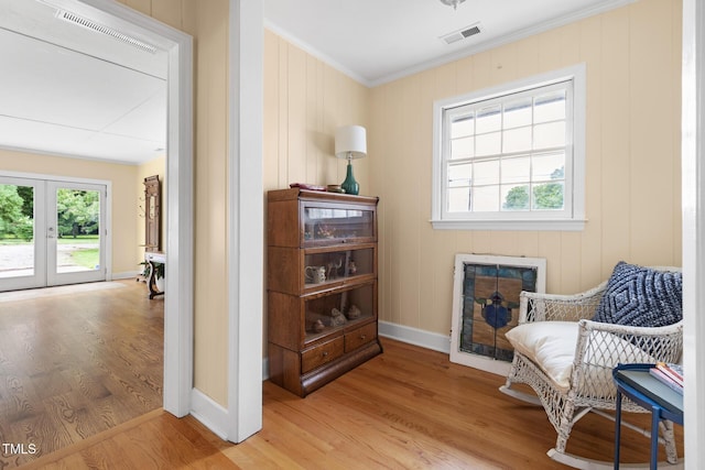 816 Miller Rd, Hillsborough, NC 27278 - living area featuring light wood-style flooring, crown molding, baseboards, french doors, and a fireplace