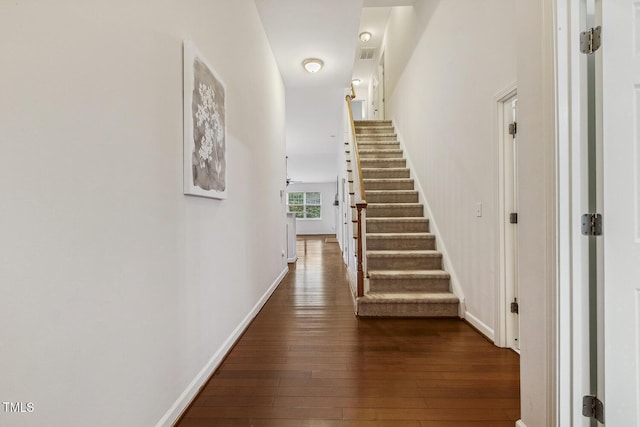 309 Plank Bridge Way, Morrisville, NC 27560 - hall featuring dark wood-type flooring, stairs, and baseboards