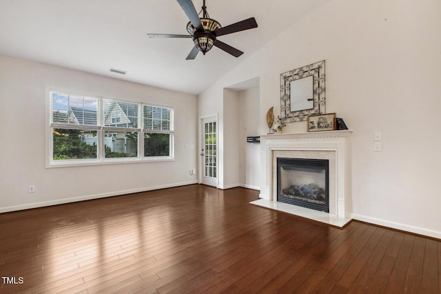 309 Plank Bridge Way, Morrisville, NC 27560 - unfurnished living room featuring ceiling fan, a high end fireplace, plenty of natural light, high vaulted ceiling, and wood finished floors