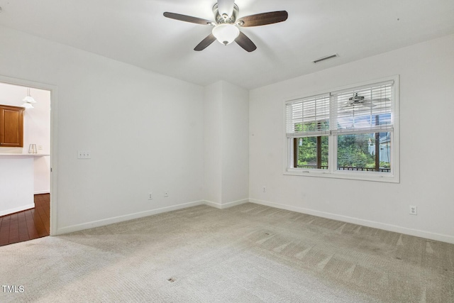 309 Plank Bridge Way, Morrisville, NC 27560 - spare room featuring light carpet, ceiling fan, and baseboards