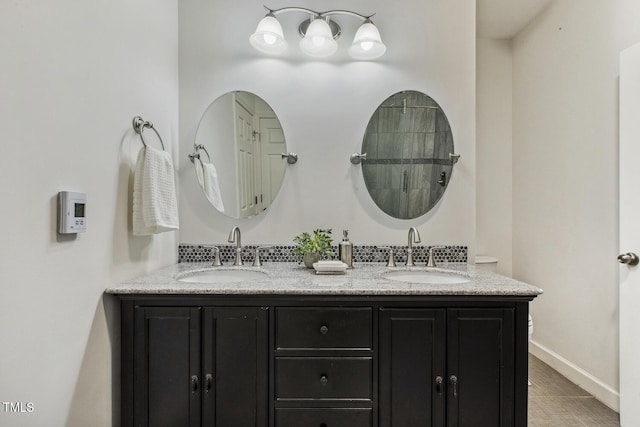 309 Plank Bridge Way, Morrisville, NC 27560 - full bathroom with double vanity and baseboards