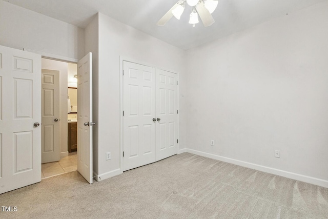 309 Plank Bridge Way, Morrisville, NC 27560 - unfurnished bedroom featuring light colored carpet, a closet, baseboards, and a ceiling fan