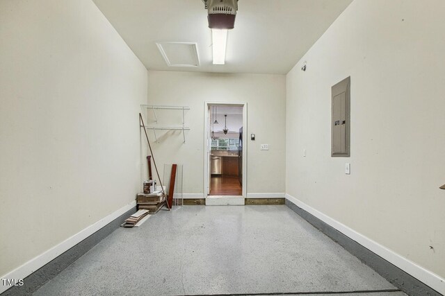 309 Plank Bridge Way, Morrisville, NC 27560 - garage featuring electric panel, a garage door opener, and baseboards