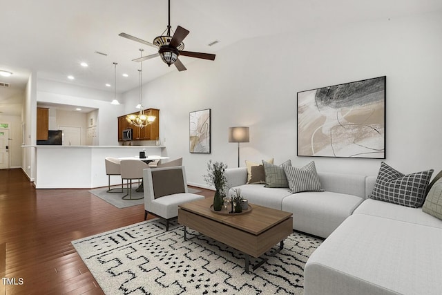 309 Plank Bridge Way, Morrisville, NC 27560 - living room with wood finished floors, a chandelier, a ceiling fan, recessed lighting, and lofted ceiling