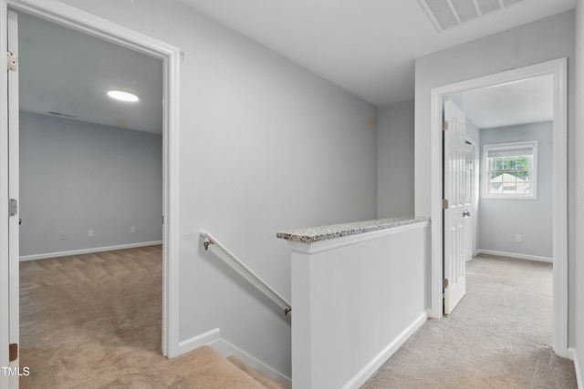 5408 Gunnette Dr, Raleigh, NC 27610 - hallway with an upstairs landing, carpet, and baseboards