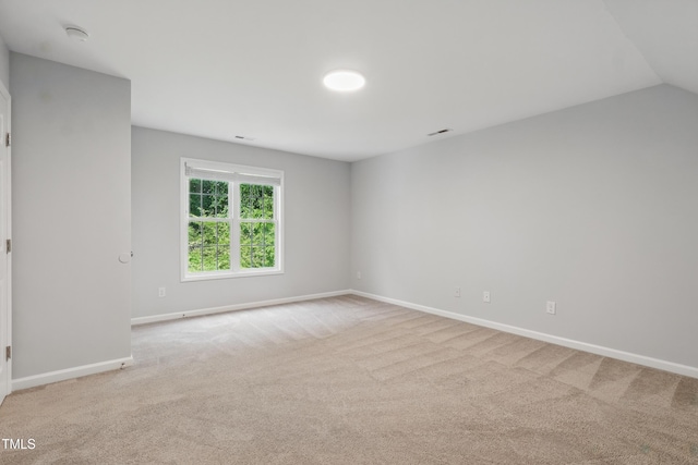 5408 Gunnette Dr, Raleigh, NC 27610 - empty room featuring baseboards, light carpet, and a smoke detector