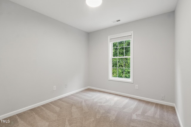 5408 Gunnette Dr, Raleigh, NC 27610 - spare room with baseboards and carpet