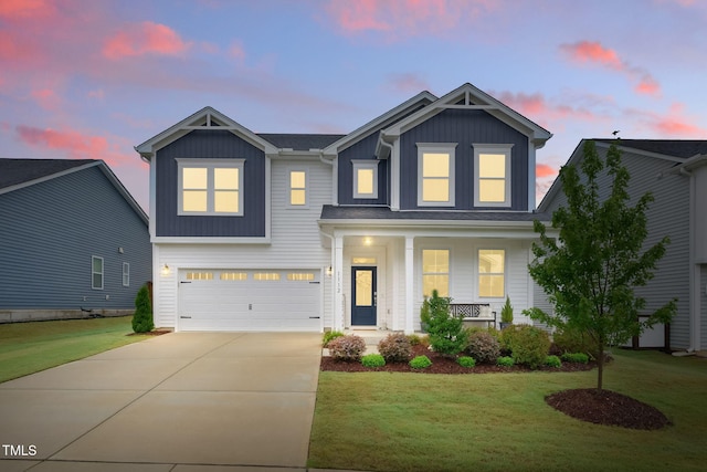 1112 Prewitt Ranch Dr, Holly Springs, NC 27540 - view of front of property with board and batten siding, concrete driveway, a garage, and covered porch
