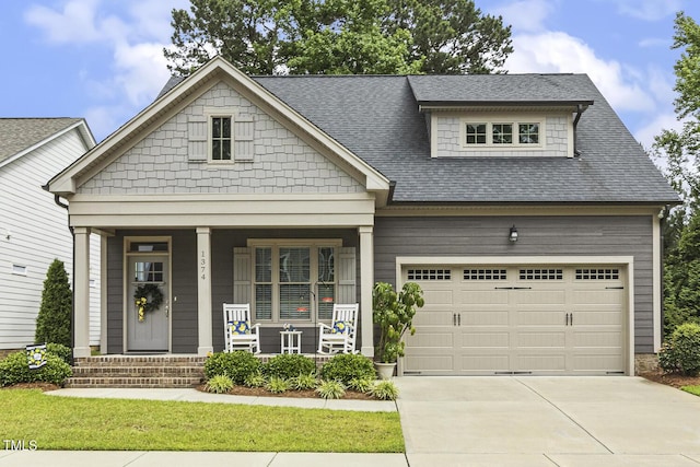1374 Patriot Points Way, Fuquay Varina, NC 27526 - craftsman-style home with covered porch, driveway, an attached garage, and a shingled roof