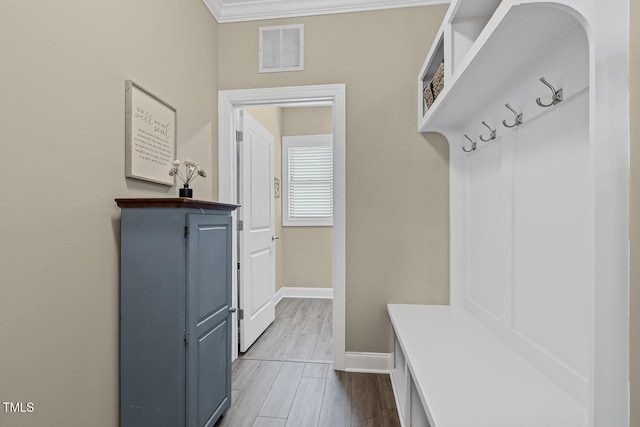 1374 Patriot Points Way, Fuquay Varina, NC 27526 - mudroom featuring baseboards, ornamental molding, and dark wood finished floors