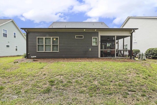 1374 Patriot Points Way, Fuquay Varina, NC 27526 - rear view of house featuring a sunroom, a lawn, and ceiling fan