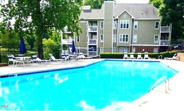 923 Springfork Dr, Cary, NC 27513 - community pool featuring a patio