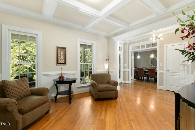 4021 Chaumont Dr, Apex, NC 27539 - sitting room with healthy amount of natural light, light wood-style floors, beam ceiling, coffered ceiling, and a chandelier