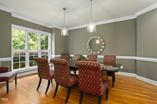 4021 Chaumont Dr, Apex, NC 27539 - dining space with wood finished floors, crown molding, and baseboards