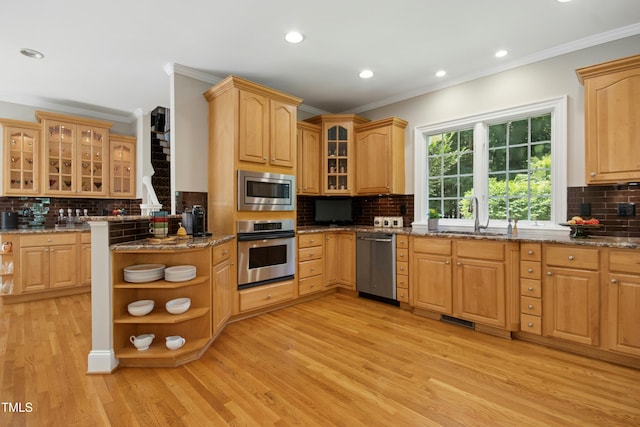4021 Chaumont Dr, Apex, NC 27539 - kitchen with appliances with stainless steel finishes, open shelves, backsplash, light wood-type flooring, and ornamental molding