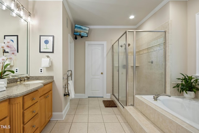 4021 Chaumont Dr, Apex, NC 27539 - bathroom featuring vanity, a stall shower, a garden tub, tile patterned floors, and ornamental molding