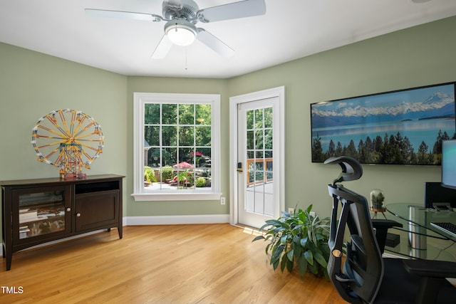 4021 Chaumont Dr, Apex, NC 27539 - home office with light wood-style floors, ceiling fan, and baseboards