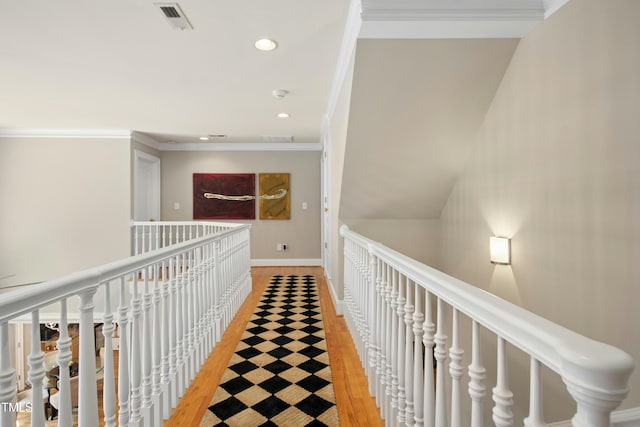 4021 Chaumont Dr, Apex, NC 27539 - hall with crown molding, recessed lighting, light wood-style floors, baseboards, and an upstairs landing