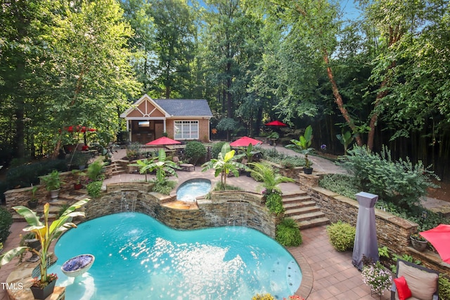 4021 Chaumont Dr, Apex, NC 27539 - outdoor pool with an in-ground hot tub, an outdoor structure, a patio area, and an exterior structure