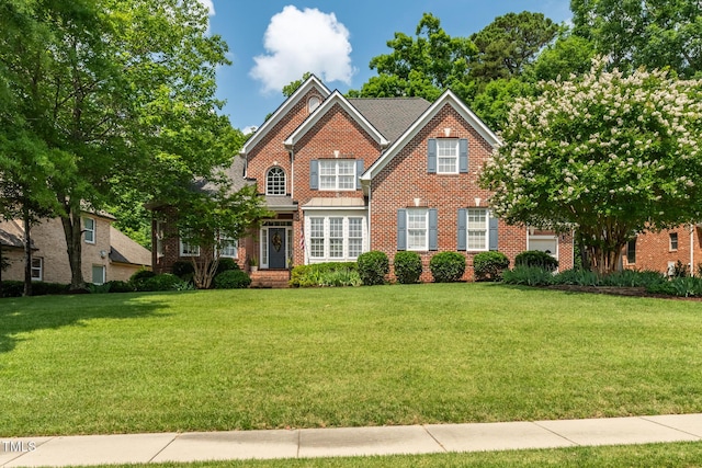 1149 The Preserve Trl, Chapel Hill, NC 27517 - traditional-style home featuring brick siding and a front yard