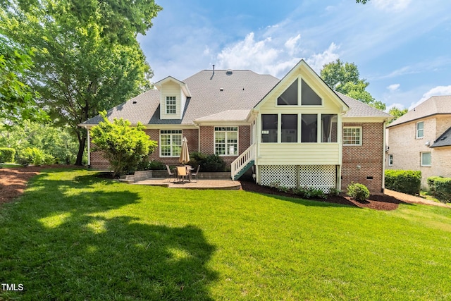 1149 The Preserve Trl, Chapel Hill, NC 27517 - back of property with brick siding, a patio, a sunroom, and a yard