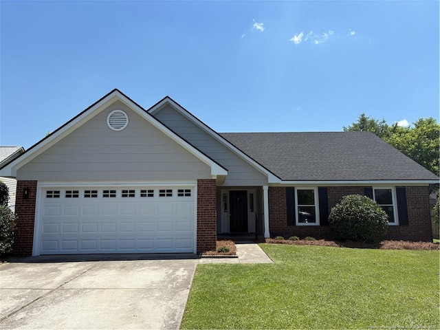 5754 Cottonbelt Way, Fayetteville, NC 28314 - ranch-style house with brick siding, concrete driveway, and a front yard