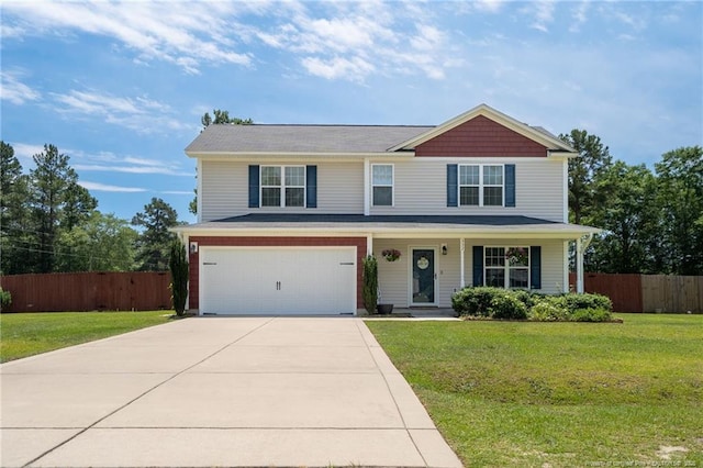 332 Dundee Cir, Raeford, NC 28376 - view of front of home with concrete driveway, a garage, and a porch
