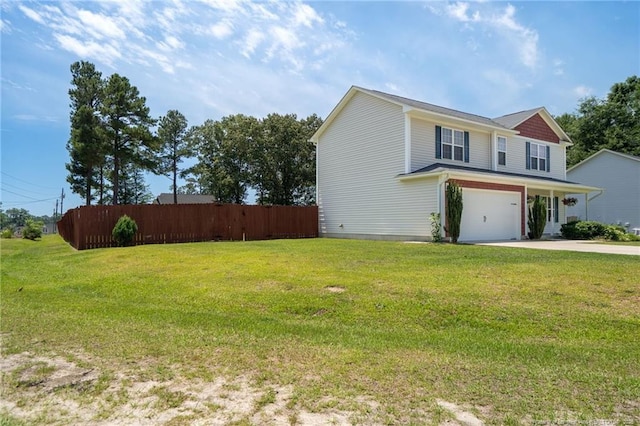 332 Dundee Cir, Raeford, NC 28376 - view of front facade with an attached garage and concrete driveway