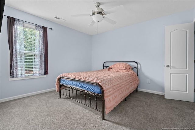 332 Dundee Cir, Raeford, NC 28376 - bedroom featuring carpet, baseboards, and ceiling fan